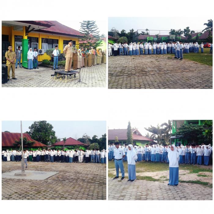 Kepala Kantor Kemenag Bungo jadi Pembina upacara bendera Senin 23 Juli 2018 di MAN 1 BUNGO .