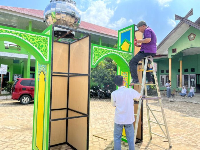 OSIM Bersama Guru Bangun Gapura PORSENI: Wujud Sinergi dan Semangat Kebersamaan