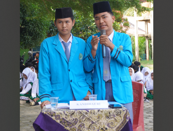 DEBAT KANDIDAT DAN PEMILIHAN KETUA DAN WAKIL KETUA OSIM MAN 1 BUNGO PLUS KETERAMPILAN SECARA E-VOTING BERLANGSUNG SECARA SENGIT 